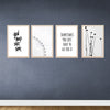Set of four golden frames arranged as a custom collage with abstract and motivational prints on a dark blue wall. - Set of 4 Abstract Aesthetic Picture Frames - 8x12" / Black - Frame World