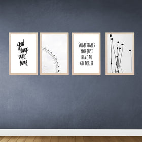 Set of four golden frames arranged as a custom collage with abstract and motivational prints on a dark blue wall. - Set of 4 Abstract Aesthetic Picture Frames - 8x12" / Black - Frame World