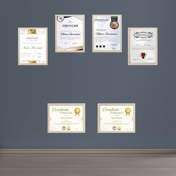 Gold diploma frames with certificates arranged in a custom collage on gray wall. - Diploma/ Certificate Frames A4 Size - Black / Pack of 2 - Frame World
