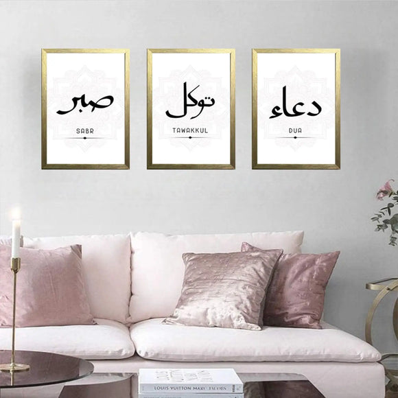 Set of 3 golden frames featuring modern Islamic Dua Shukr calligraphy collage above pink velvet sofa. - Set of 3 Modern Islamic Dua Shukr Wall Frames - Black / 8x12" - Frame World