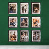 Set of nine 10x12 inch glass front picture frames with custom 7x9 inch prints arranged on a green wall.