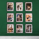 Set of nine 10x12 inch glass front picture frames with custom 7x9 inch prints arranged on a green wall.