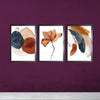 Set of 3 abstract photo frames with minimalistic watercolor designs in blue, brown, and beige tones on purple wall.