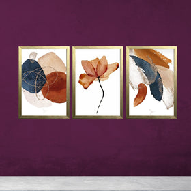 Set of 3 abstract photo frames with golden borders featuring modern watercolor designs on a purple wall background