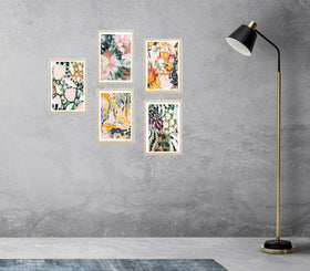 Set of 5 colorful abstract art prints in white frames arranged in a custom collage on concrete wall. - Set of 5 Colorful Abstract Wall Hanging Frames - 8x10" / Black - Frame World