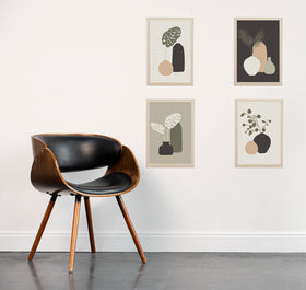 Set of 4 custom abstract photo frames in black, white, and beige tones arranged as a collage on white wall. - Set of 4 Abstract Photo Frames - 8x12" / Black - Frame World