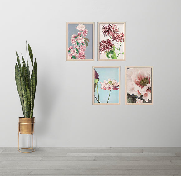 Set of 4 custom golden frames with floral collage art arranged on a light gray wall. - Set of 4 Aesthetic Wall Decoration Photo Frames - 8x12" / Black - Frame World
