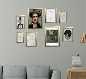 Golden abstract photo frames collage with custom art prints on gray wall above gray sofa. - 8 Pcs Aesthetic Abstract Photo Frame set for Wall 12" x 16" (2 piece) , 8" x 12" (4 pieces) and 6" x 8" (2 pieces) - Black - Frame World