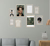 White custom collage frames in varied sizes with abstract and portrait art on a light gray wall above a gray sofa. - 8 Pcs Aesthetic Abstract Photo Frame set for Wall 12" x 16" (2 piece) , 8" x 12" (4 pieces) and 6" x 8" (2 pieces) - Black - Frame World