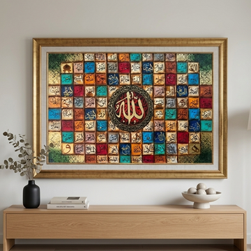 A large framed Islamic wall art print featuring a colorful grid of Arabic calligraphy tiles with a central gold and red calligraphic motif, displayed in a modern living room setting above a wooden console table.