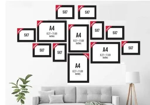 Black collage photo frames set with 12 custom rectangular frames arranged above a gray sofa. - Pack of 12- Collage Photo Frames set - Black - 12 pc - Frame World