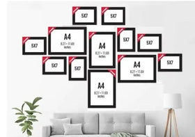 Black collage photo frames set with 12 custom rectangular frames arranged above a gray sofa. - Pack of 12- Collage Photo Frames set - Black - 12 pc - Frame World