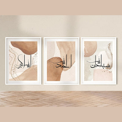 Three framed abstract artworks with calligraphy on a beige wall.