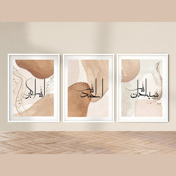 Three framed abstract artworks with calligraphy on a beige wall.
