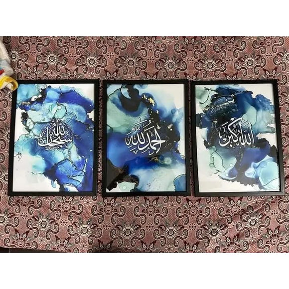 Set of 3 modern Islamic wall art frames with black frames and blue abstract background designs, glossy glass covered prints.