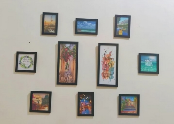 Set of 10 black collage photo frames in various sizes arranged on a wall for custom display. - Set of 10 Collage Photo Frames - Black - Frame World