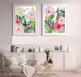 White frames with tropical floral collage prints featuring pink hibiscus and green leaves on wall above beige armchair and. - 2 PCS Motivational Quote Picture Frame, Abstract Frames - Black / 8x12" / 1 - abstract frames, art, frame world, home decor, inspiration, motivational frames, office decor, quote frames, wall decor - Frame World
