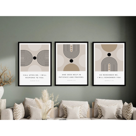 Three framed abstract art prints on a wall above a sofa