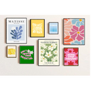 Collection of colorful framed artworks on a white wall