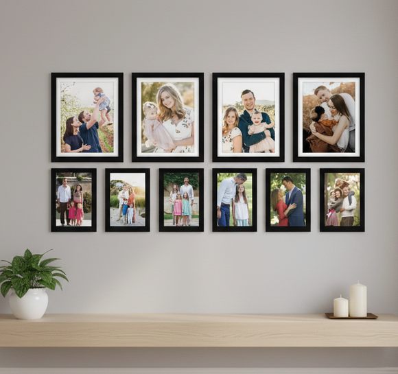 Wall with family photos in black frames
