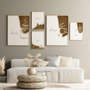 A set of five framed calligraphy prints with a white and gold color scheme, displayed on a wall above a beige sofa with decorative cushions.