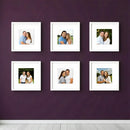Set of six custom square photo frames arranged in a collage gallery wall displaying couple portraits on a purple wall