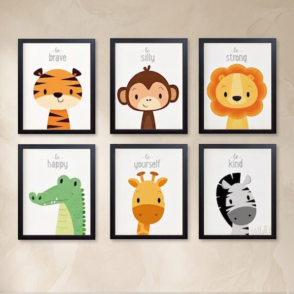 Set of six framed animal prints on a wall with motivational phrases.