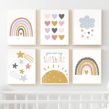 A set of six picture frames with various designs including rainbows, hearts, stars, and suns, intended for nursery or kids room decor.