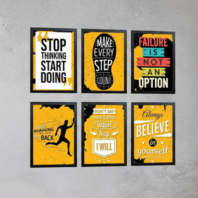 Motivational posters on a gray wall 