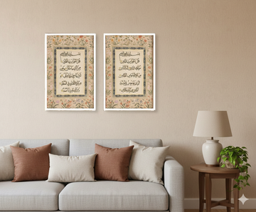 Two framed pieces of calligraphy art on a beige wall above a sofa.