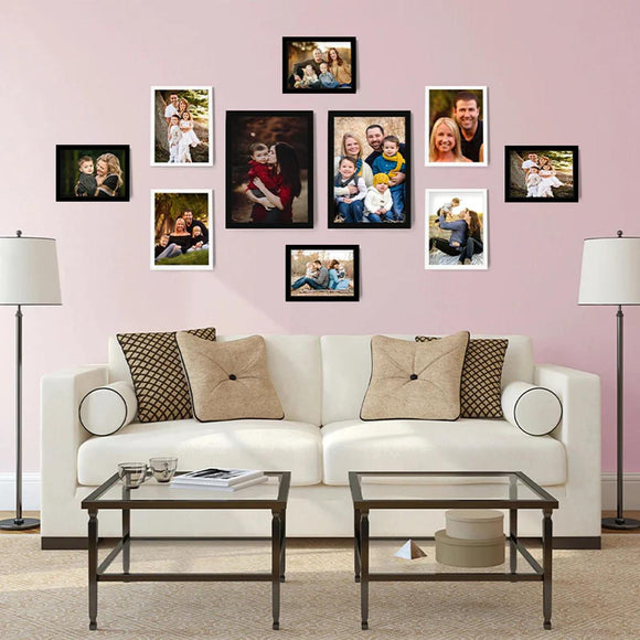 Set of 10 black and white collage frames in various sizes arranged on pink wall above white sofa with beige and patterned. - Collage Wall Photo Frame Set of 10 – Customizable Multi-Size Display - Black - Frame World
